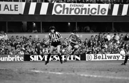 Robert Wilson plays the ball across the penalty area