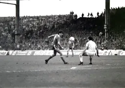 The ball sits up between Mick Harford and Mick McCarthy