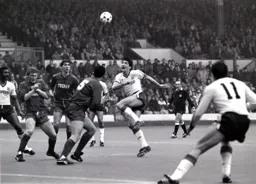 Mick Harford about to jump in for the ball