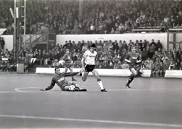 Mike Newell is stopped by a last ditch tackle