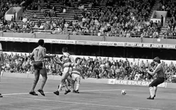 Mark Stein stabs the ball past David Seaman for the Town`s first goal