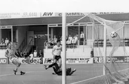Mike Newell slams in Town`s second goal. Future Hatter Trevor Peake is the City defender