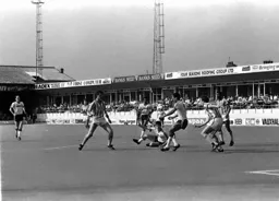 Brian Stein has his back to the goal and is closed down by future Hatter Trevor Peake