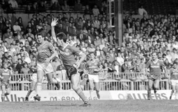 Mike Newell calls for the ball