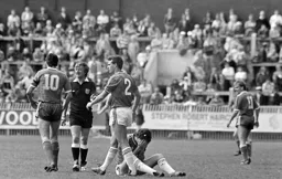 The referee wants a word with Mick Harford