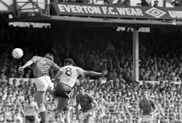 Brian Stein heads the ball on