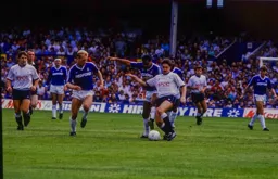Brian Stein and Tim Breacker look to win the ball