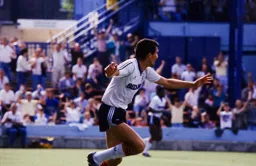 Mick Harford wheels away after scoring the Town`s first goal