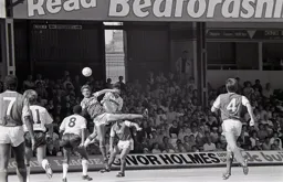 Mike Newell tries to head to Stein and Preece