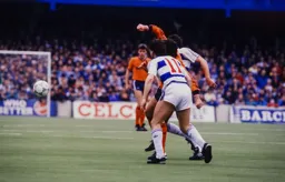 Mal Donaghy watches from in the background