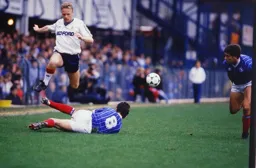 Micky Weir is tackled by future Hatter Mick Kennedy