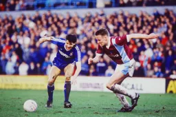 Mick Harford battles with Gary Strodder