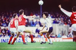 Mick Harford and Tony Adams look to win the ball