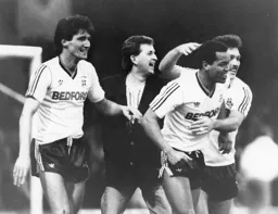 Mick Harford, Ian Allinson and a supporter celebrate with Brian Stein after scoring his goal
