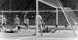 Mick Harford scores the Town`s only goal of the game