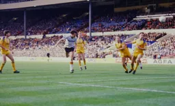 Mick Harford sends a header towards goal