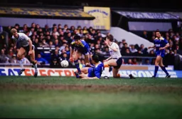 Kingsley Black passes the ball looking for Tim Breacker