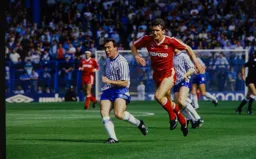 Mick Harford in an unfamiliar all red kit