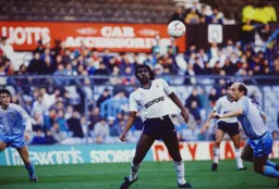 Ricky Hill and Greg Downes watch the flight of the ball