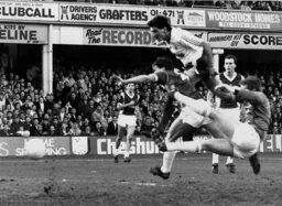 Mick Harford gets above Steve Potts to head in Town`s first goal