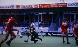 Ricky Hill has Stephen Pears stretching for the ball