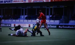 Mick Harford goes to ground