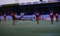 Mick Harford tries a long range shot