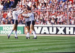 Steve Foster and David Preece celebrate with Mick Harford after scoring his goal