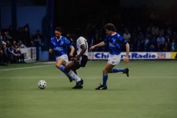 Ricky Hill and Gary Micklewhite go for the ball