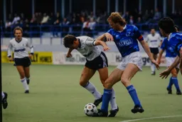 Danny Wilson tussles for the ball with Mark Wright