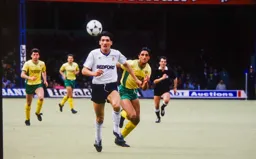 Mick Harford chases a through ball