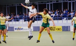 Mick Harford wins a header