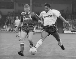 Roy Wegerle in a tussle for the ball with Steve Nicol
