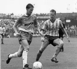 Dave Beaumont is closed down by Tony Dobson