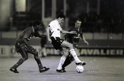 Mick Harford with his foot on the ball