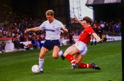 Tim Breacker about to take a hit from Stuart Pearce