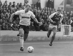 Tim Breacker leaves Tony Adams in his wake