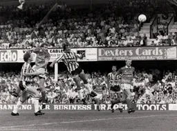 Lars Elstrup heads in his and Town`s second goal