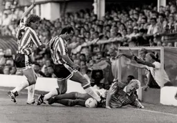 Iain Dowie is fouled by Jimmy Case much to the annoyance of John Faulkner