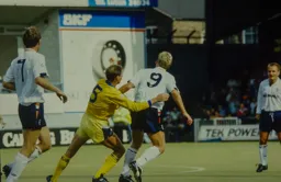 Iain Dowie trying to get away from the grips of the Leeds defender