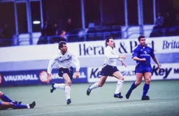 Lars Elstrup and Kingsley Black make a dash for the ball