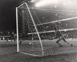 Alec Chamberlain gets down to save as Town win the penalty shoot out