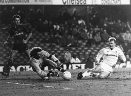 Iain Dowie tries to slip the ball under Chelsea Keeper Dave Beasant