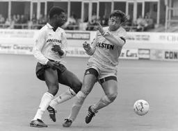 Marvin Johnson gets the ball past Gary Mabbutt