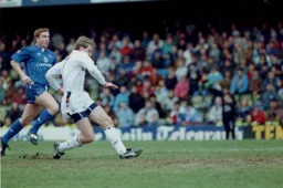 Lars Elstrup slides in Town`s first goal