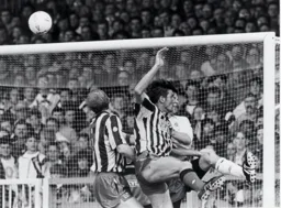 Derby`s Mick Harford defending the away teams goal