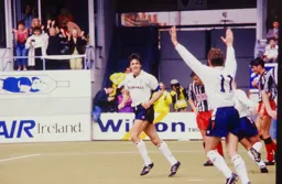 Kingsley Black and John Dreyer celebrate the unfortunate own goal scored by Mick Harford which kept the Town up again