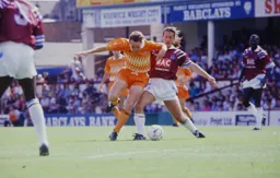 Kingsley Black tussling in midfield