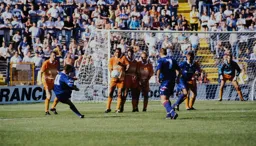 Brian Stein about to take the full force of a Dennis Wise freekick