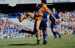 Sean Farrell in a tussle with a Chelsea defender